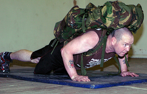 Paddy Doyle push ups with 80lb backpack